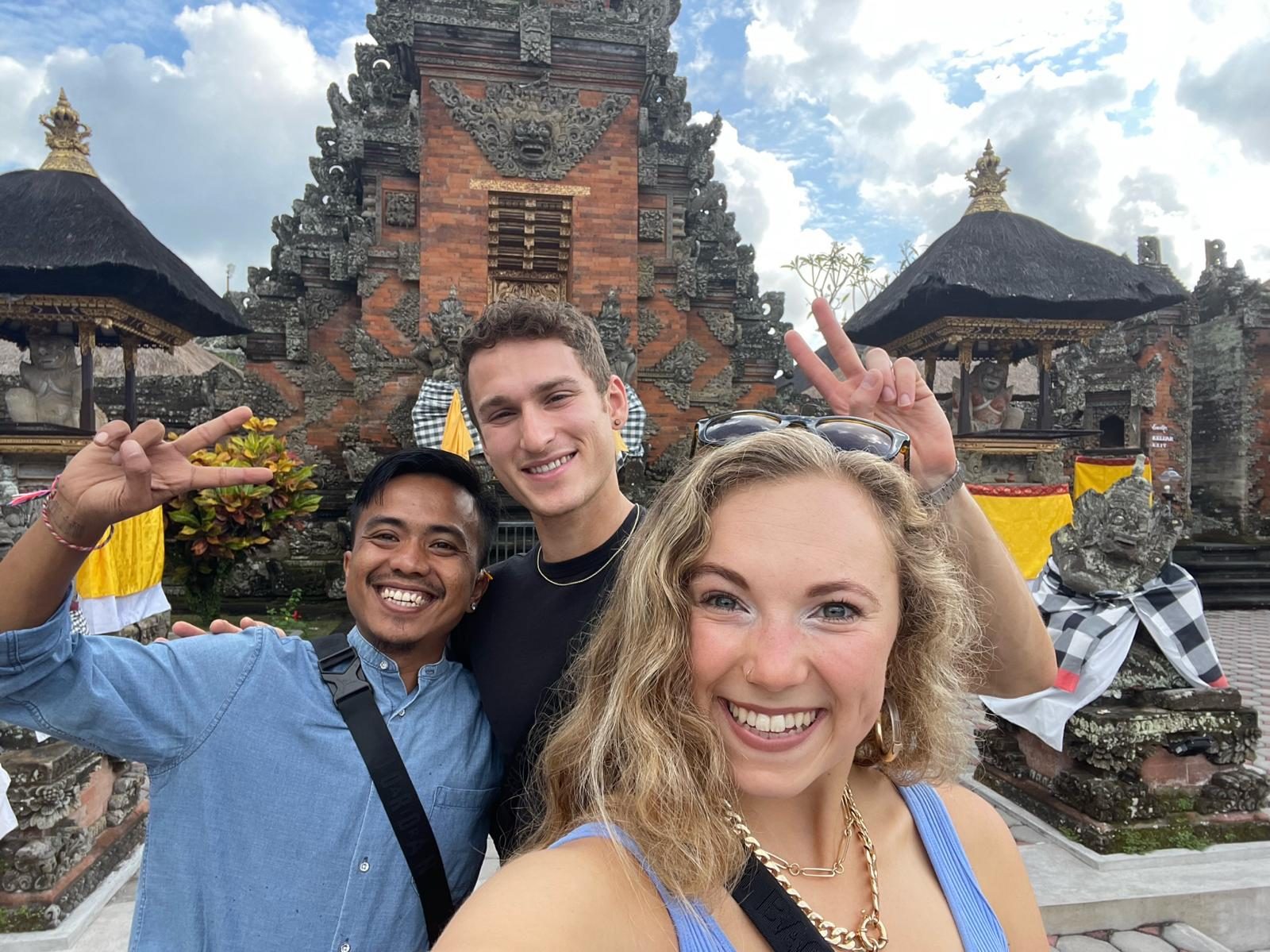 Awan with guests at a Balinese temple