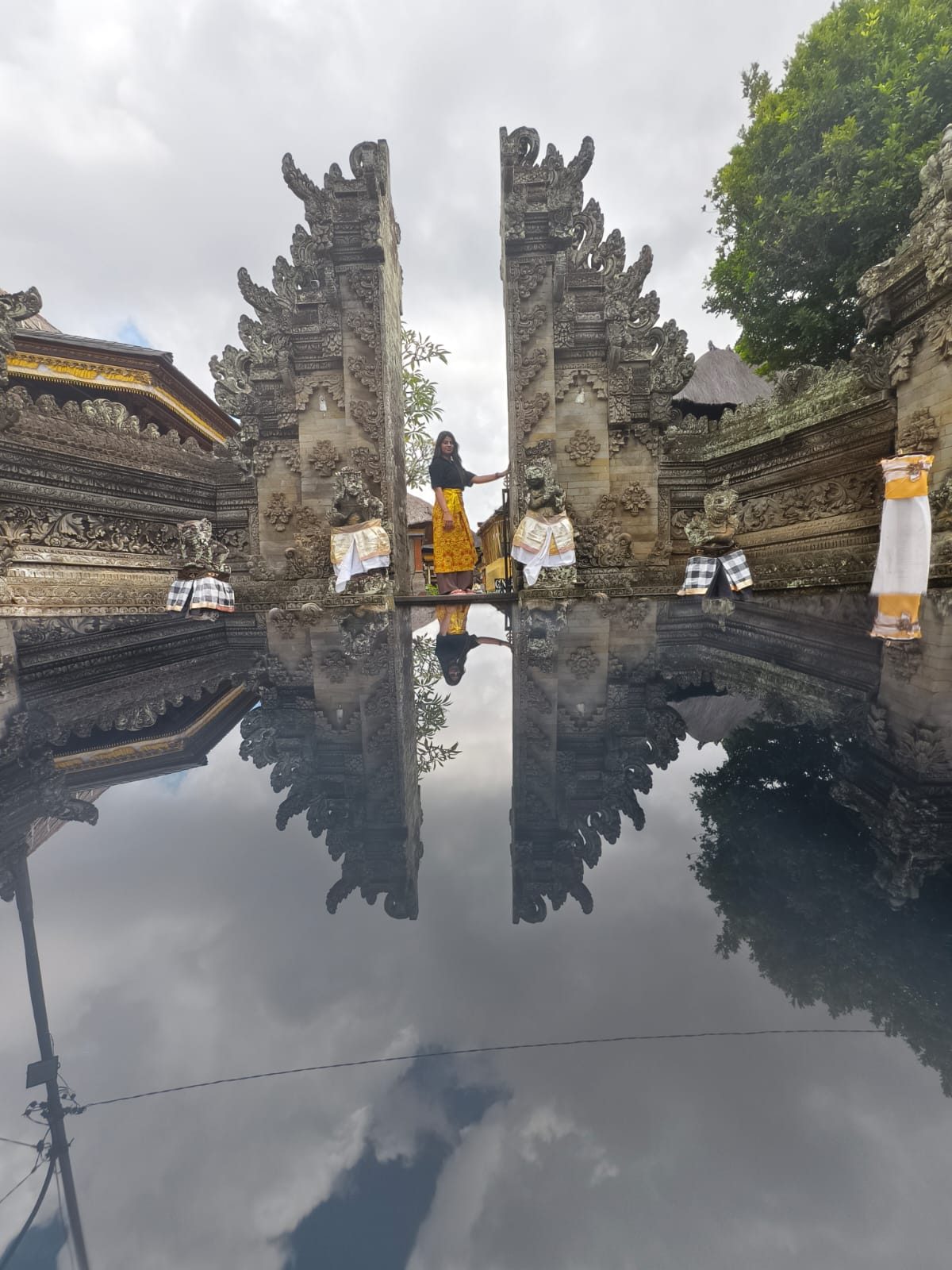 The Gate of Heaven with its mirror reflection, Lempuyang Temple
